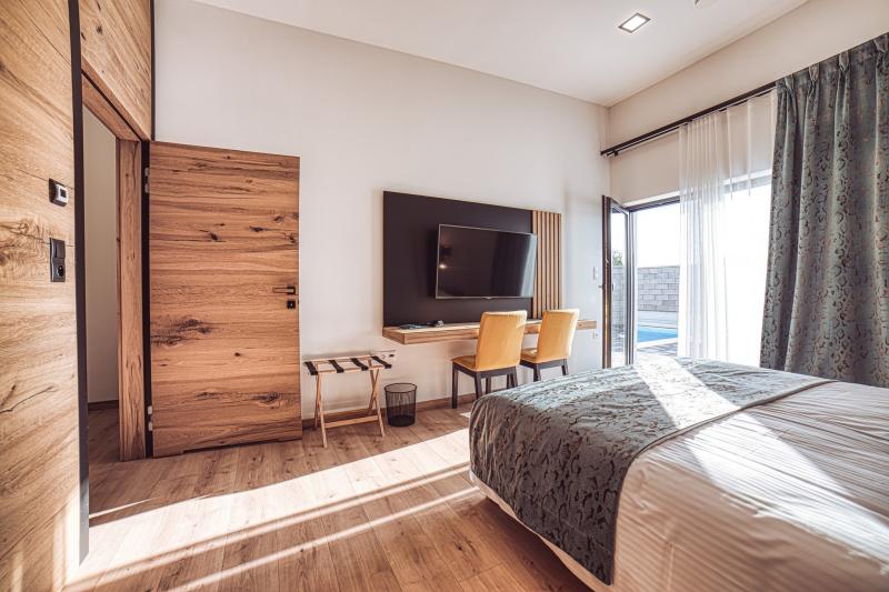 Izba Prémium apartmán pri wellness zóne v Camastra s.r.o. – Prémium apartmán spálňa